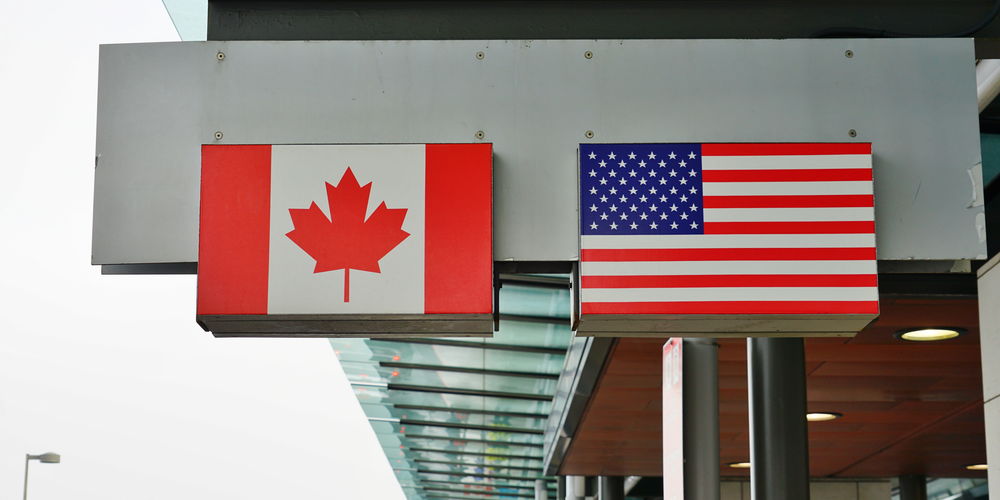 Canada flag, US flag