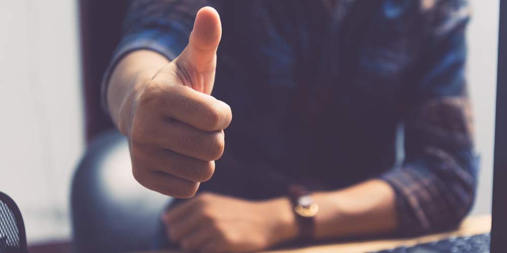 Thumbs up, signifying PointsBet satisfaction with Canadian operations in Q4FY24