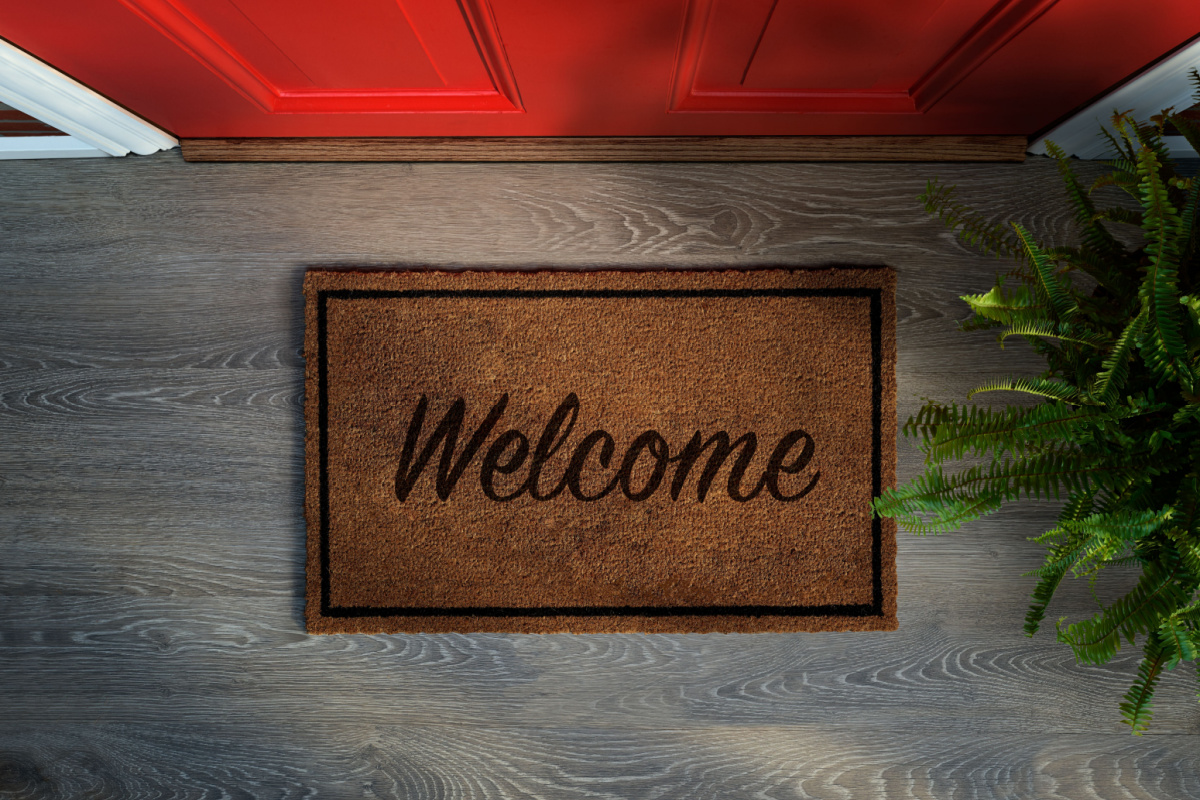Welcome mat in front of door