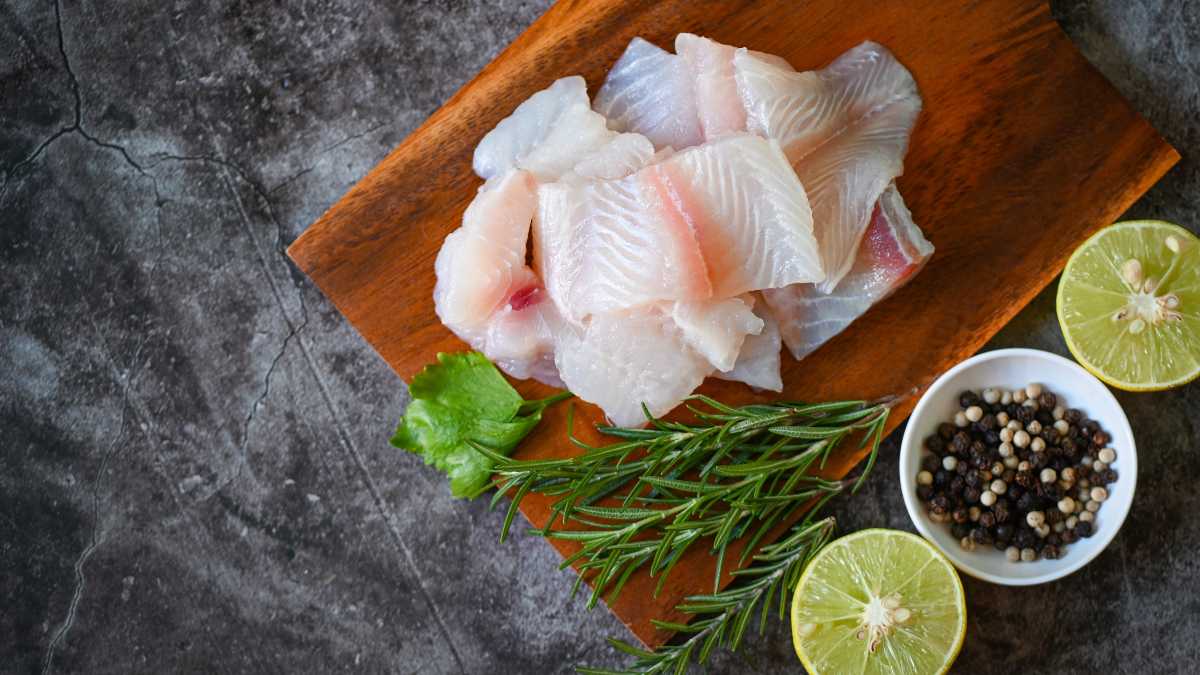 Raw fish on a cutting board