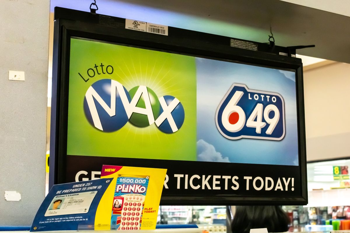 A Lotto Max and Lotto 649 sign for OLG at an Ontario retailer