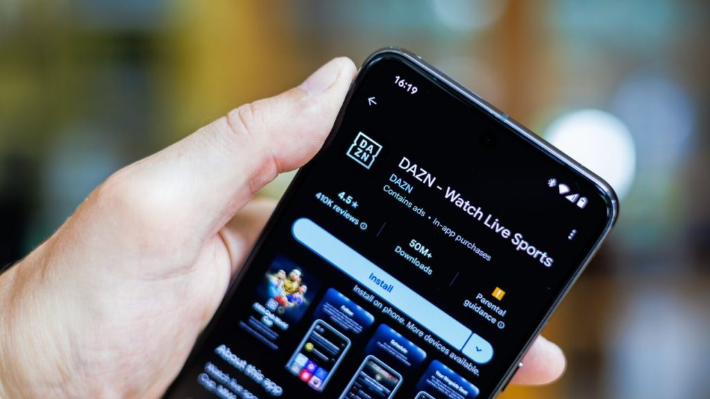 A person installing the DAZN Bet app on their phone