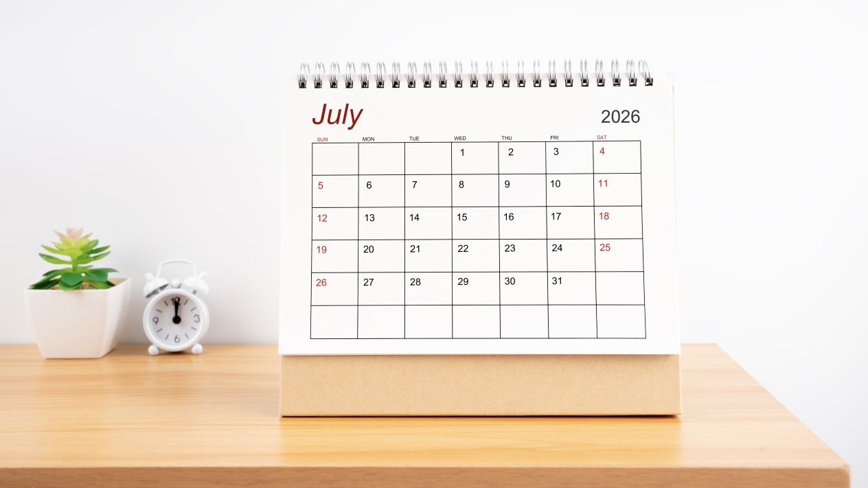 A calendar turned to July 2026