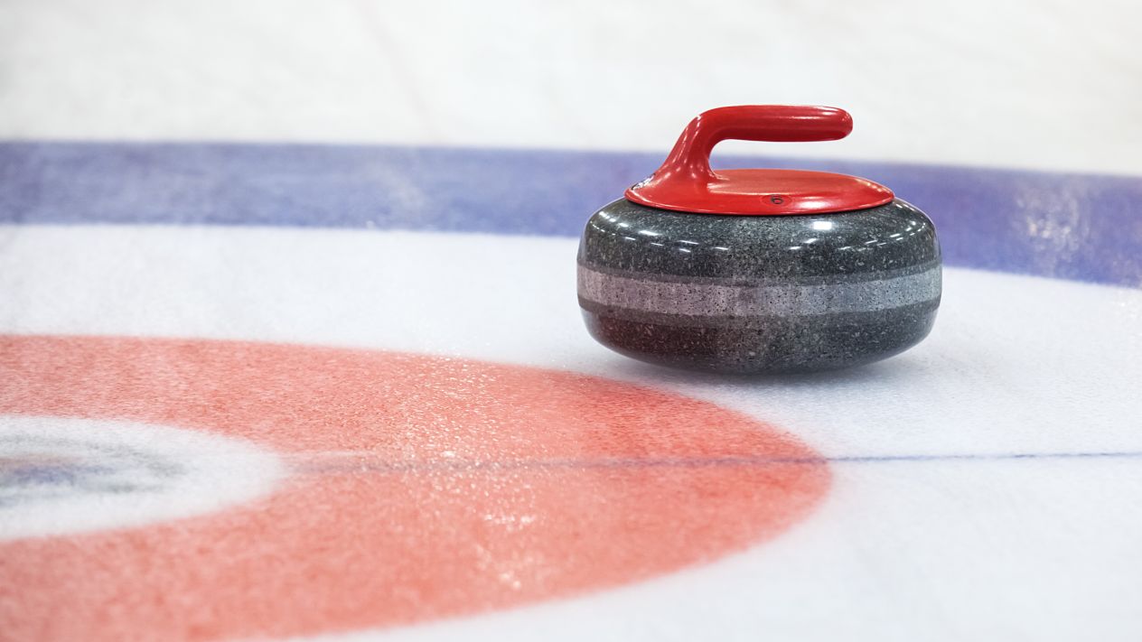 A curling stone on the ice