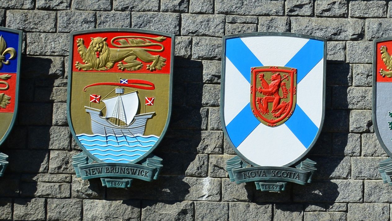 The coats of arms of New Brunswick and Nova Scotia