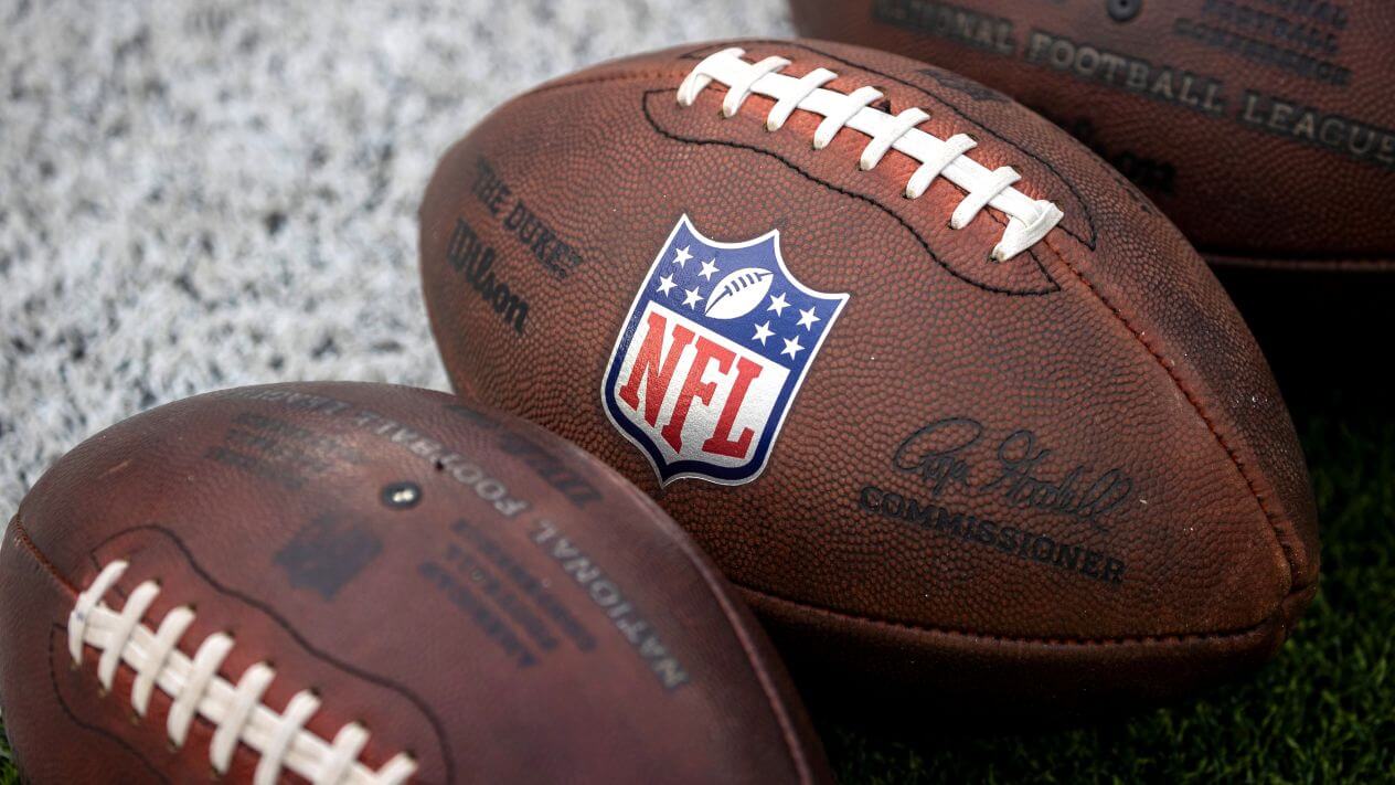 The NFL logo on a football